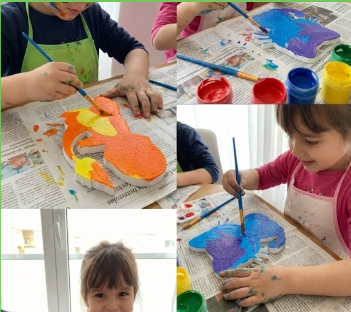 Crianças participando de uma oficina real de pintura